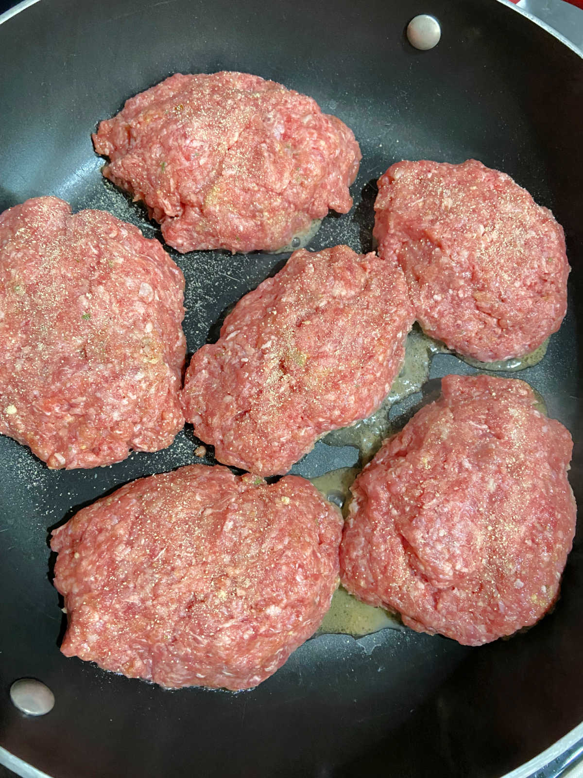 meat patties in a pan.
