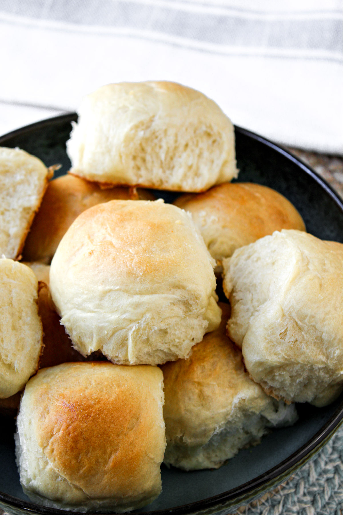 homemade dinner rolls in a bowl. 