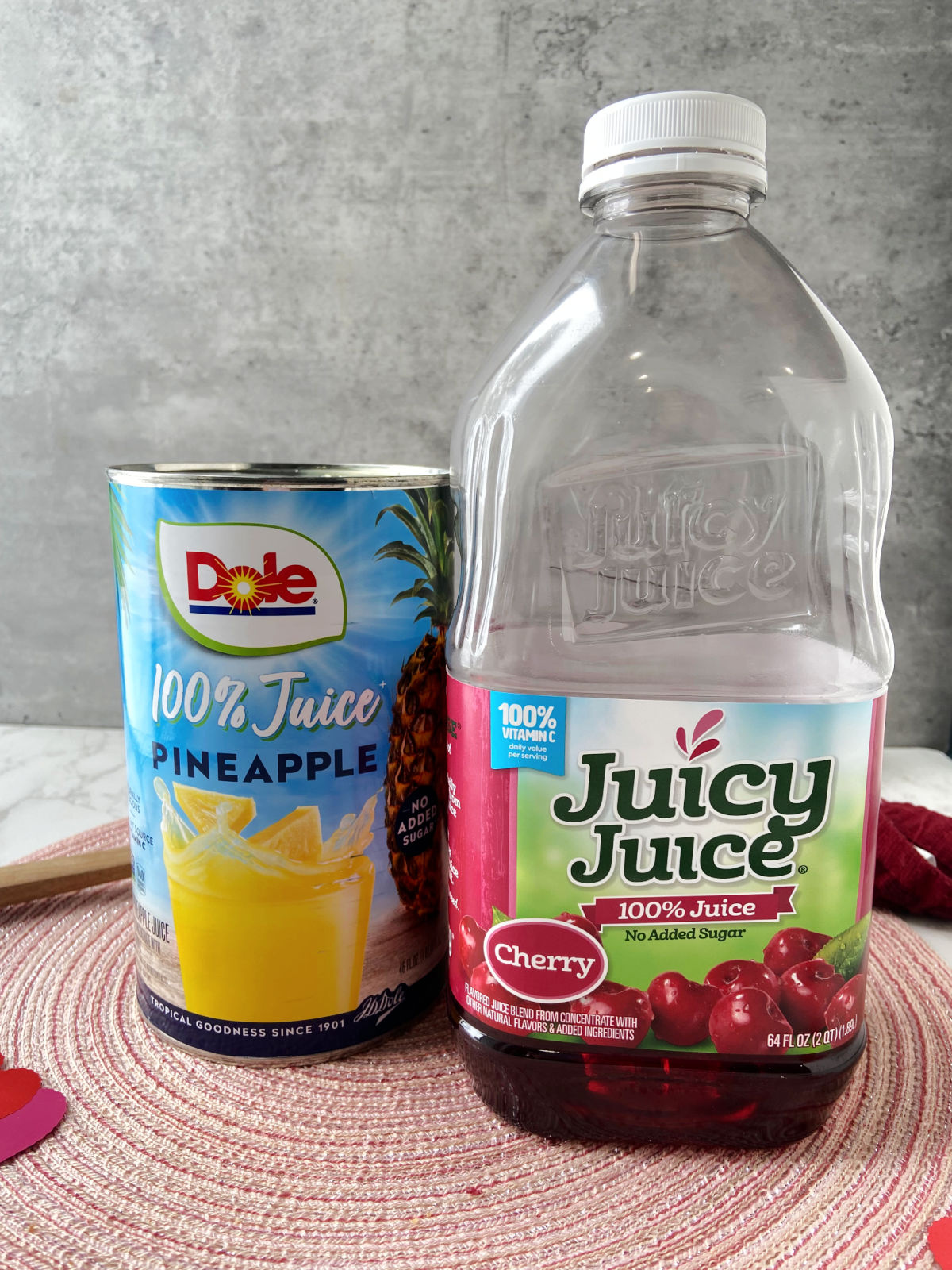 bottle of juicy juice and bottle of pineapple juice. 