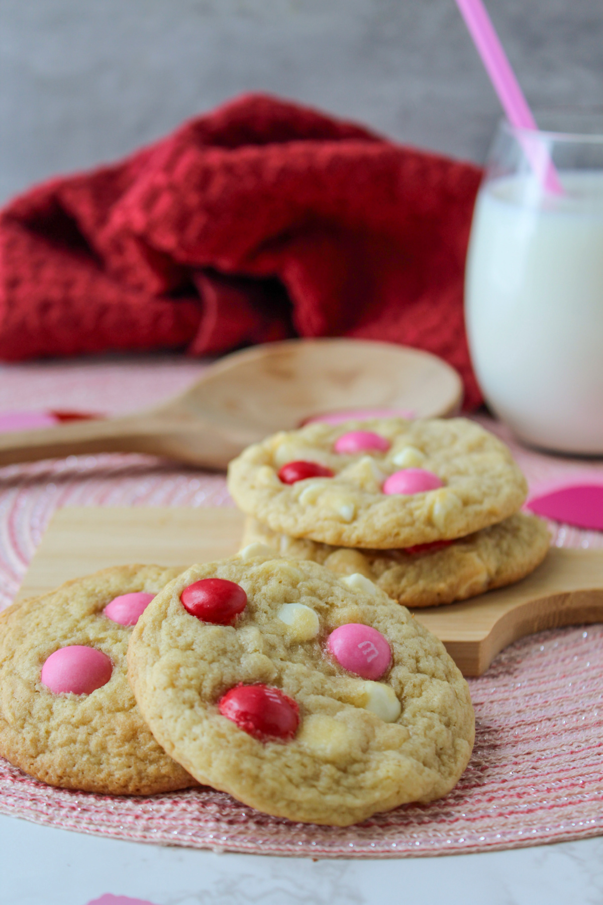 Valentine cookies on a pink mat. 