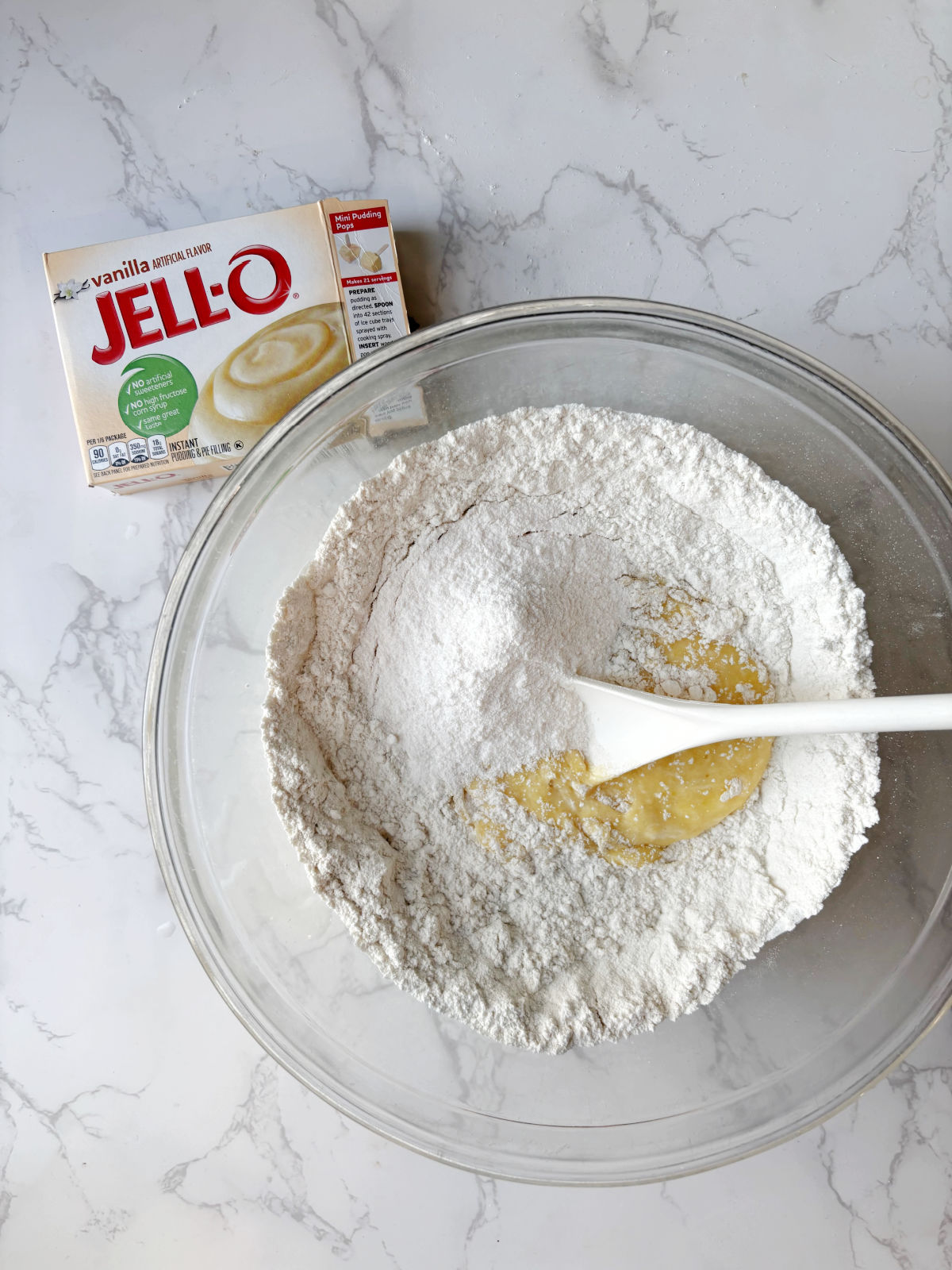 vanilla pudding by a bowl. 
