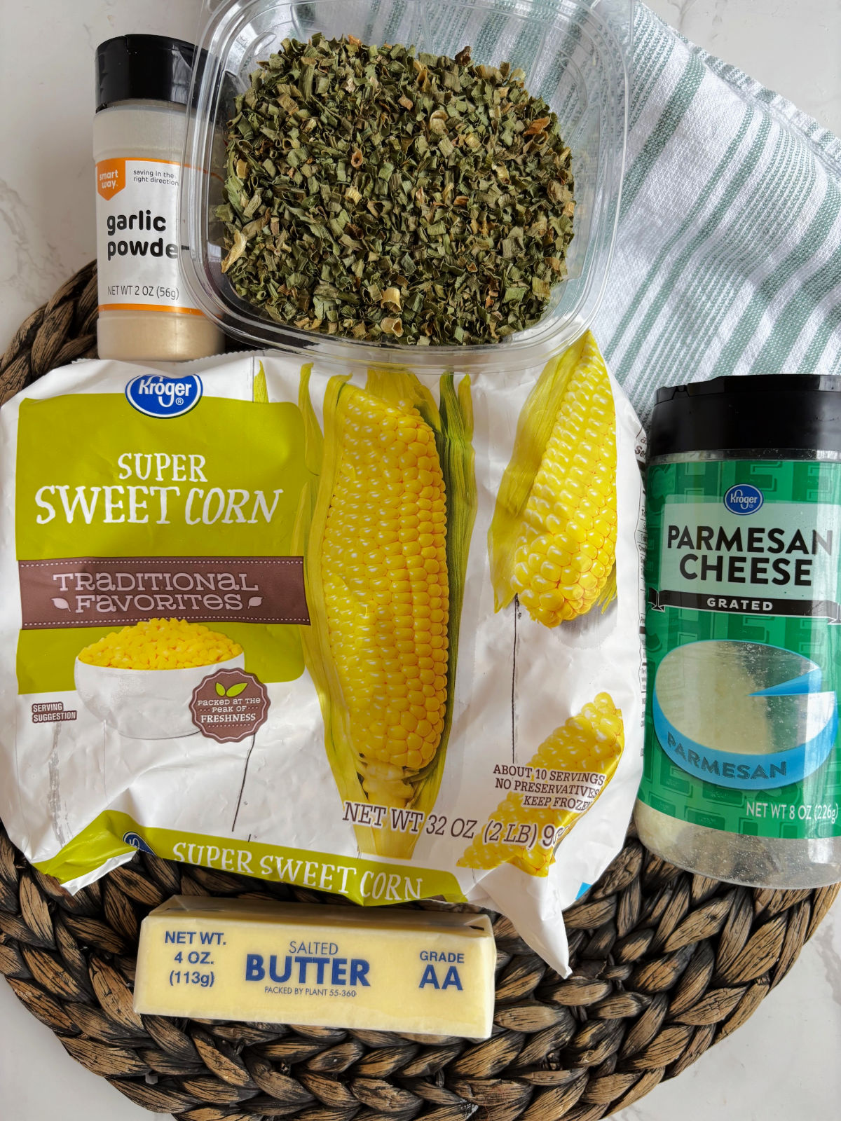 fried corn ingredients with frozen corn, butter, parmesan cheese. 