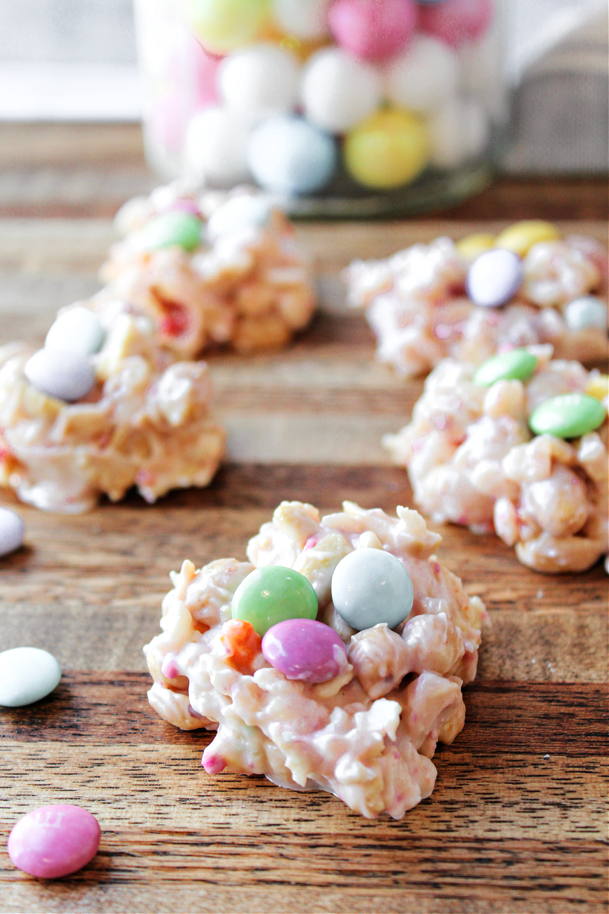 Easter candy on a wooden board.