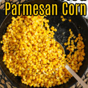 Fried Parmesan Corn with a large spoon in a frying pan.