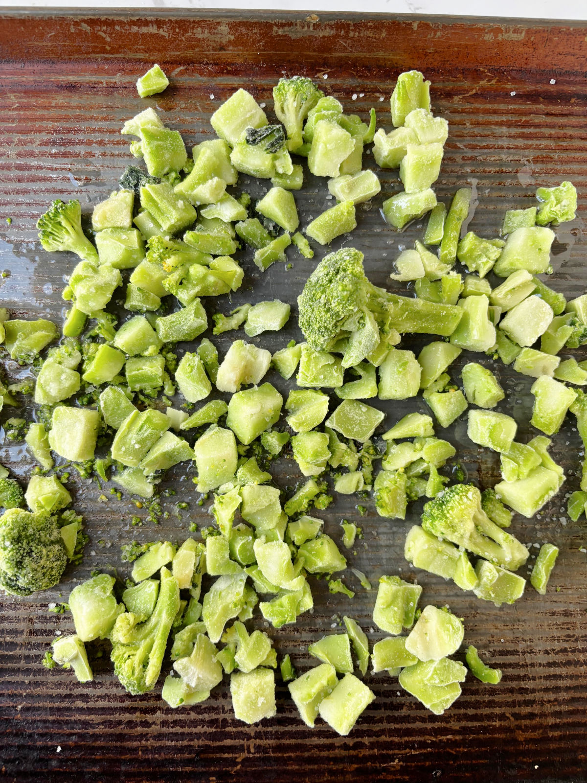 broccoli cuts on a pan.