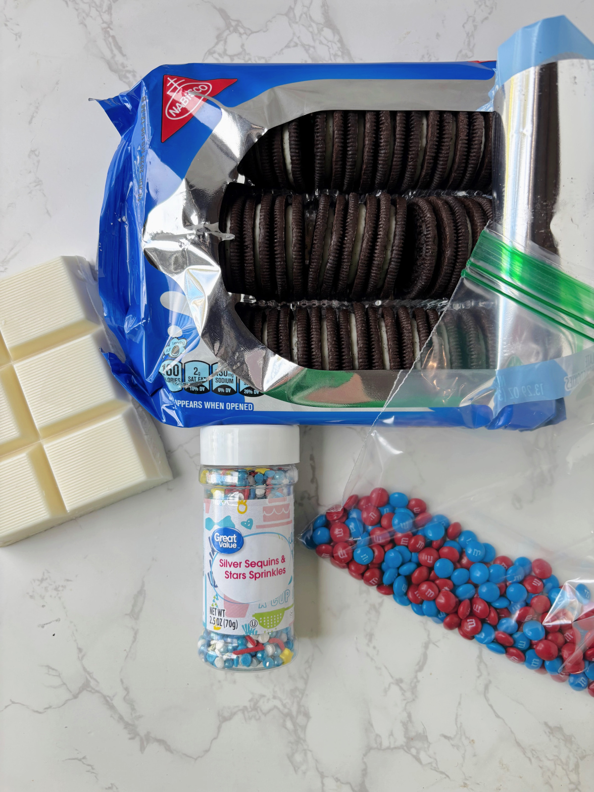 oreo cookies, almond bark, sprinkles and m&m's.