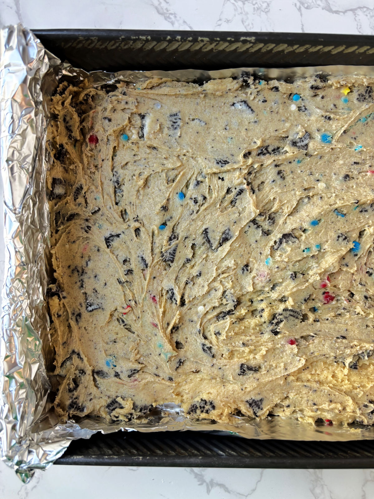 cookie dough on bottom of pan.