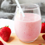 diary free strawberry shake with a straw.