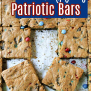 Loaded Patriotic Cookie Bars cut into squares and on foil.