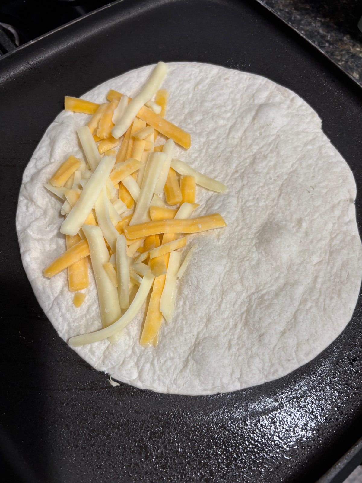 cheese on a tortilla.