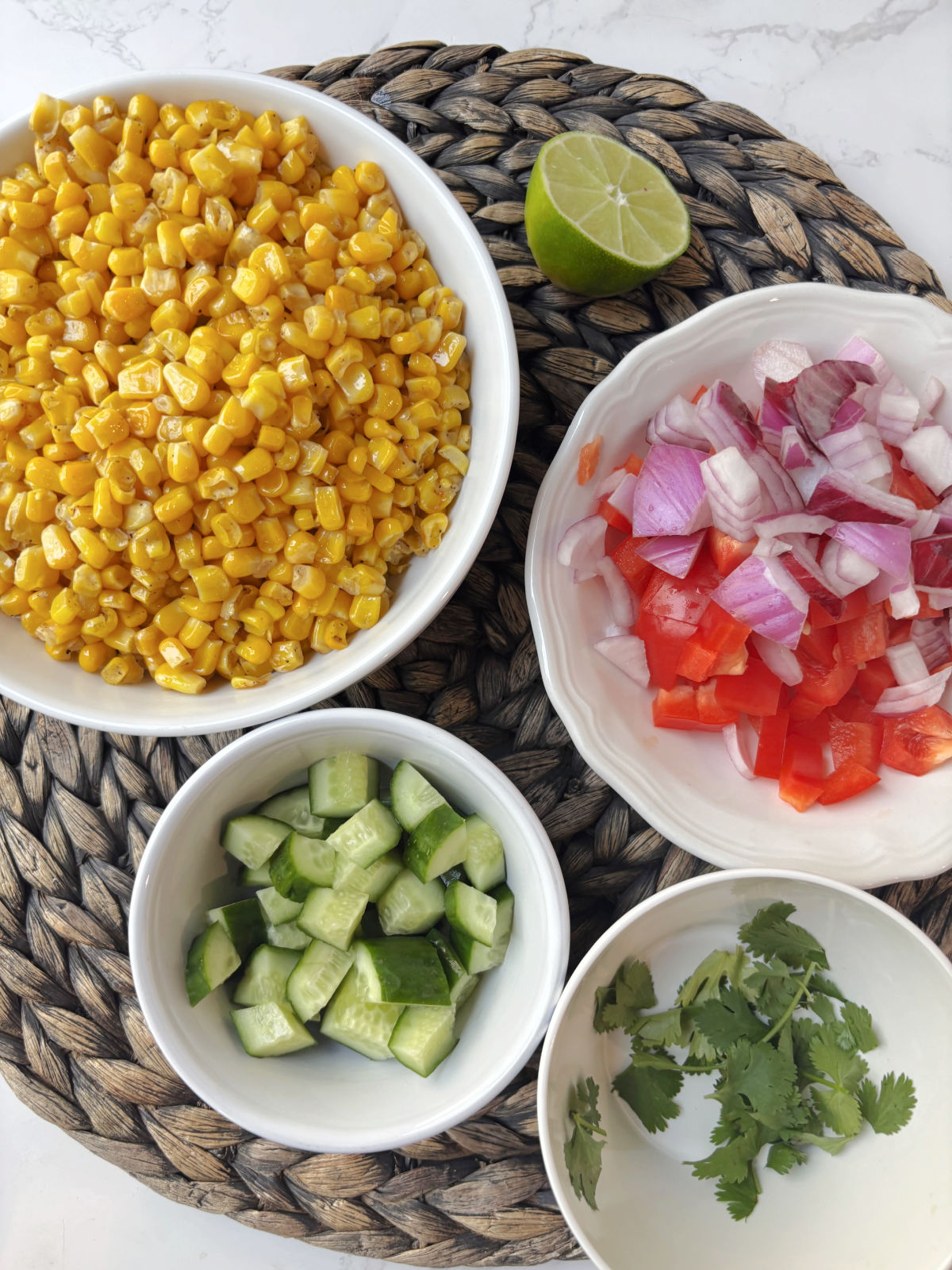 bowls of cut vegetables.