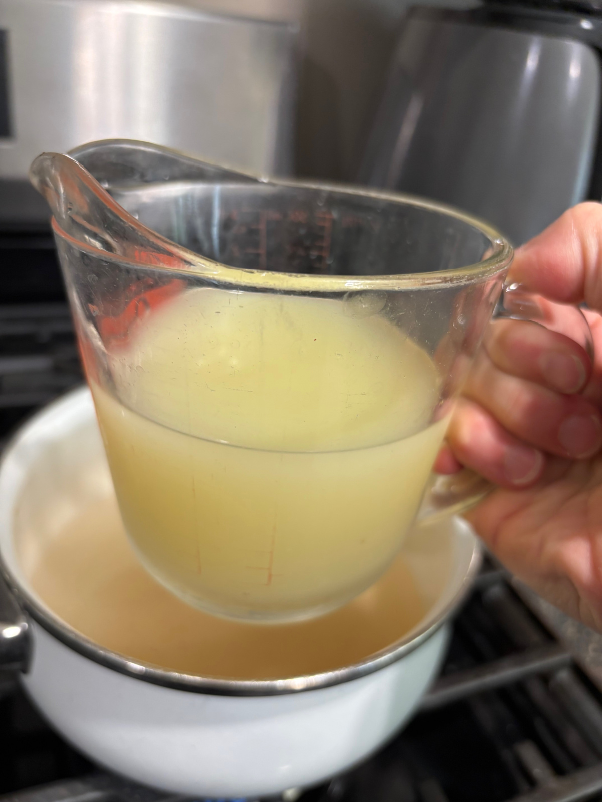 lemon juice in a measuring cup.