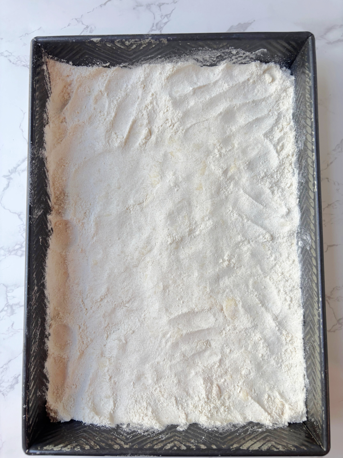 shortbread crust in a pan.