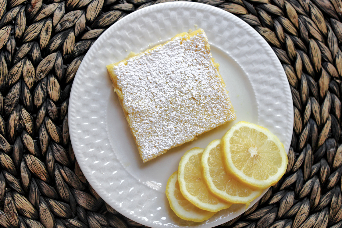 lemon bar on a white plate.