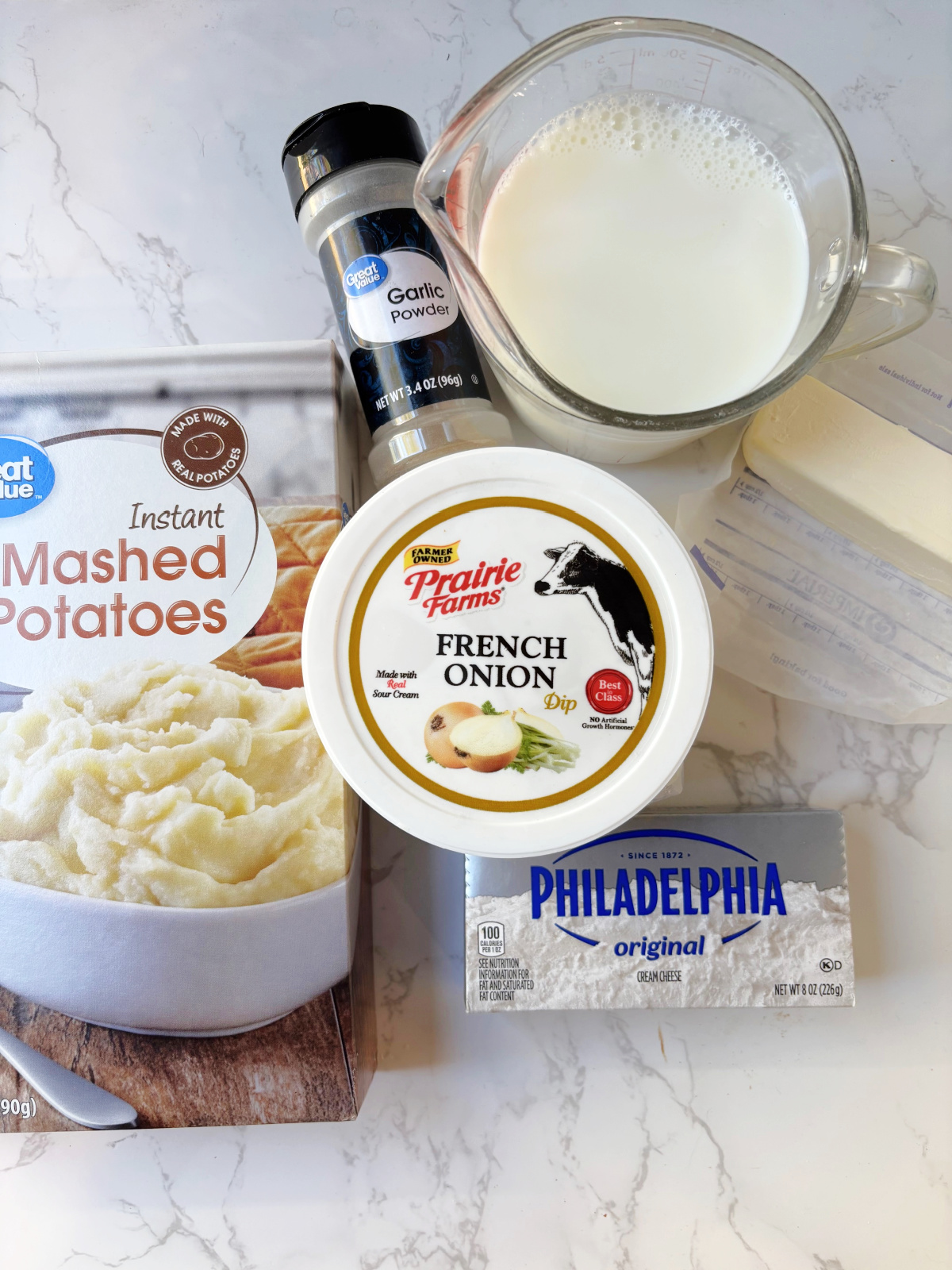 instant potatoes box, French onion dip, milk and cream cheese.