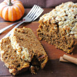 pumpkin coffee cake with two forks behind.