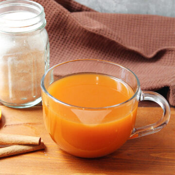 Russian Tea on a wooden board with the mix behind.