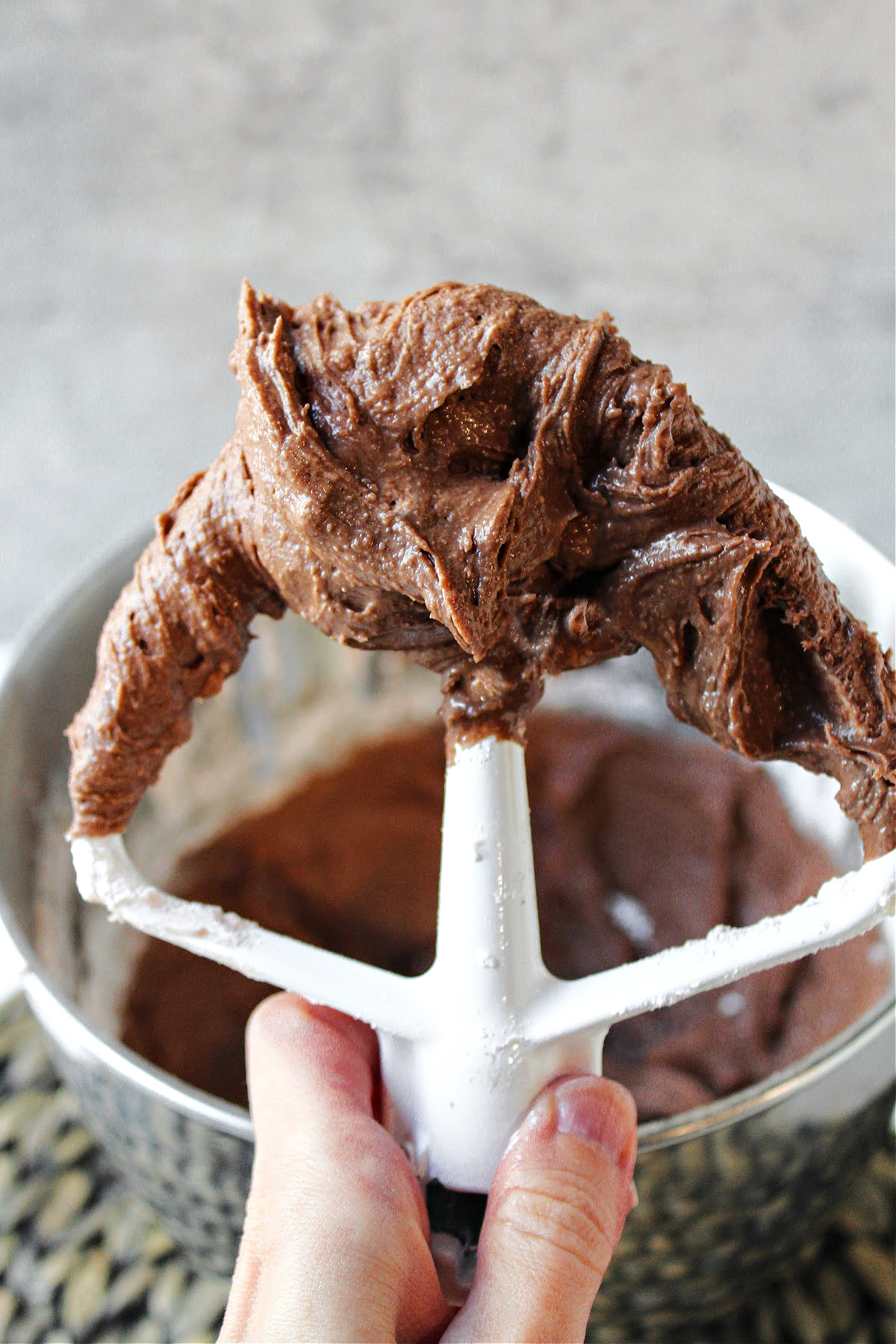 chocolate frosting on a mixing paddle.