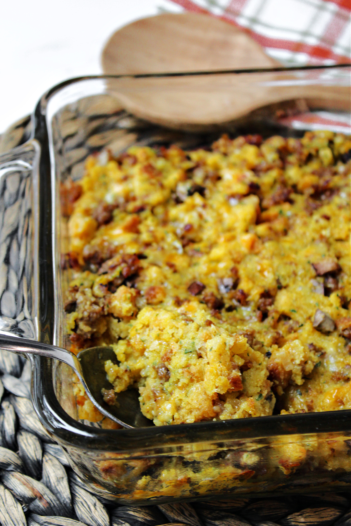 stuffing casserole in a clear baking dish.