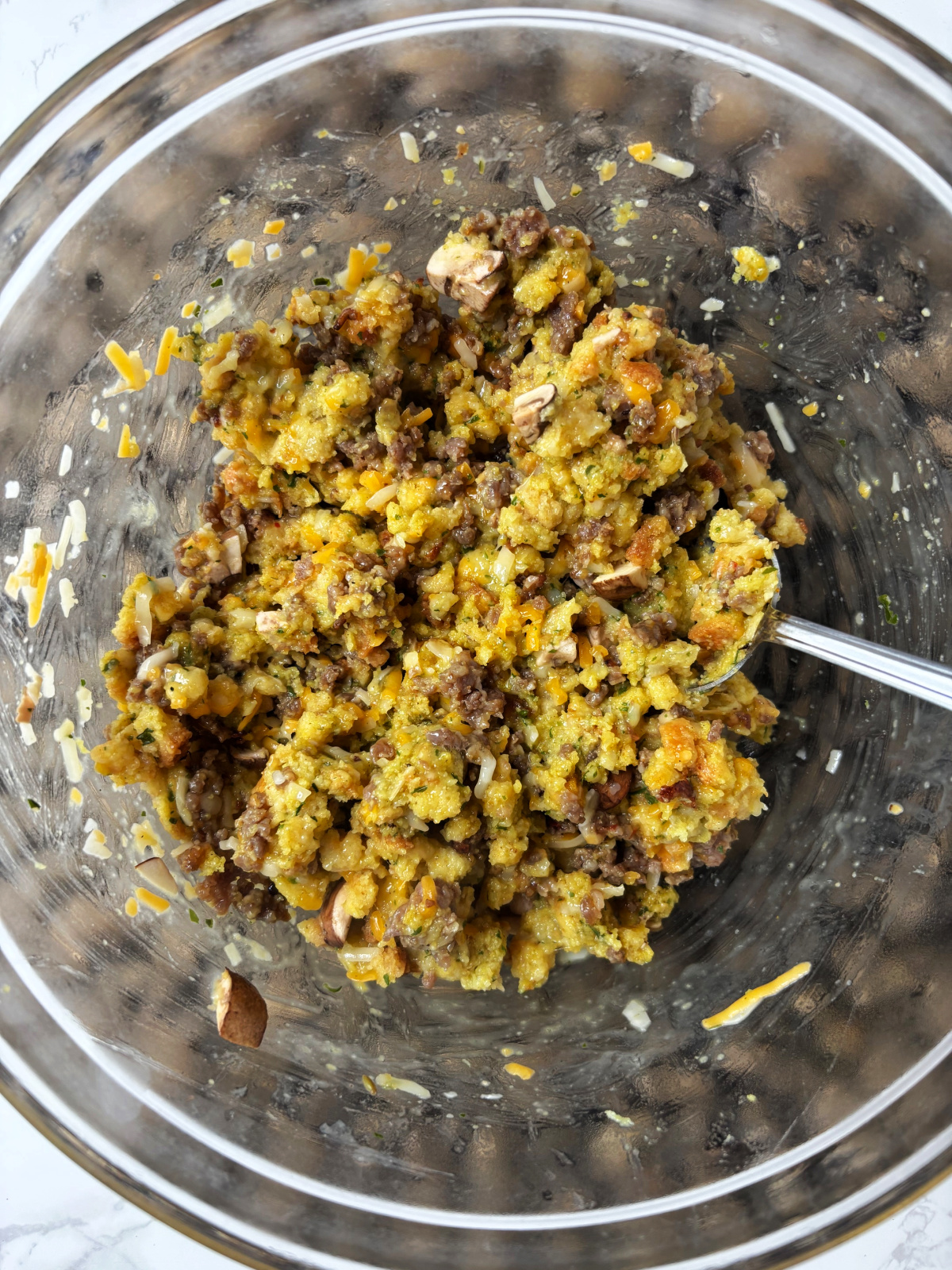 stuffing casserole mix in a clear bowl.