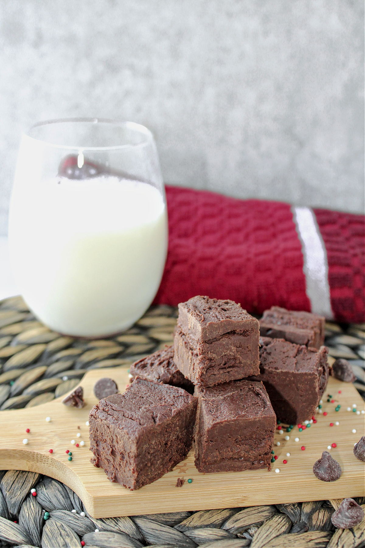homemade fudge on a small cutting board. 
