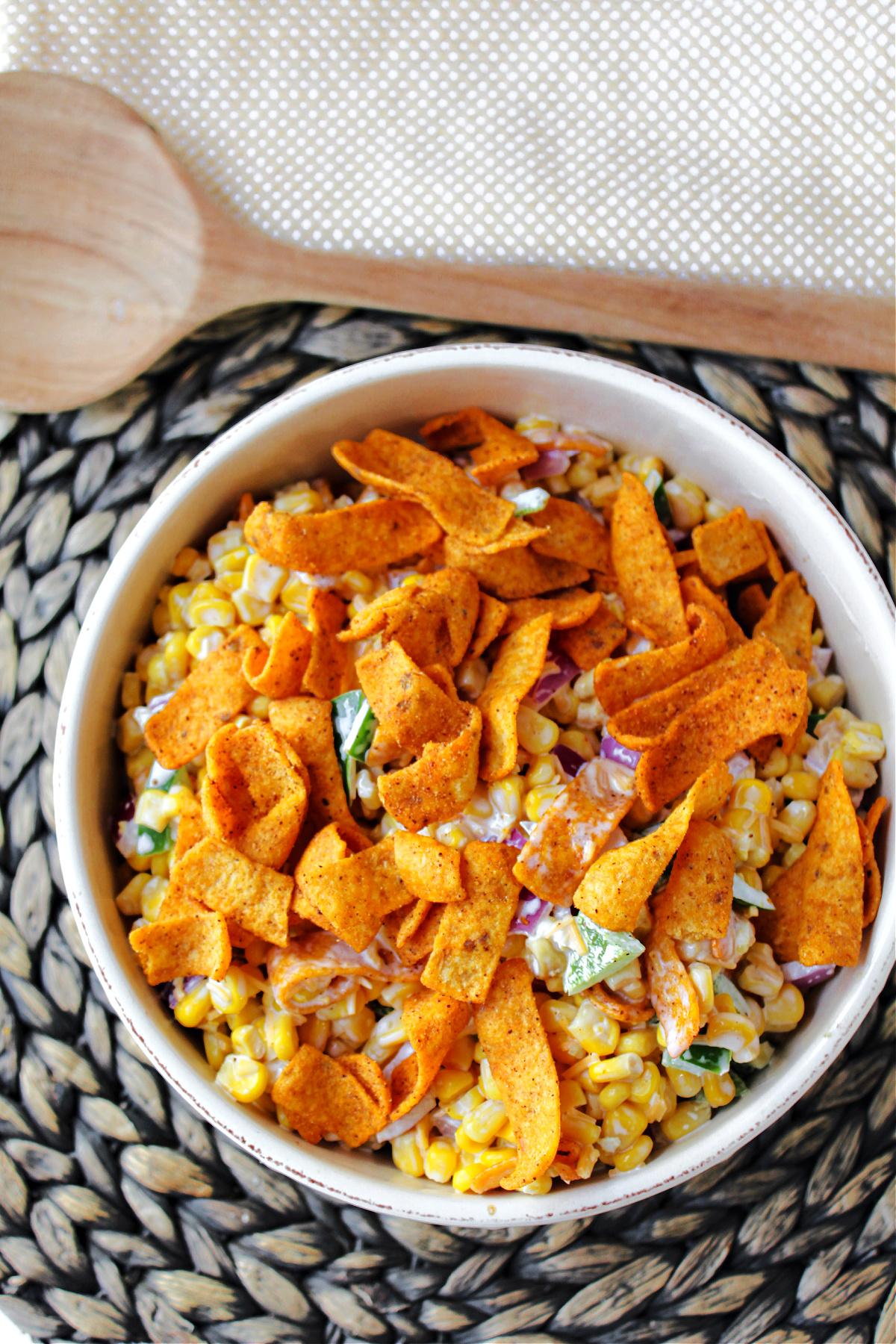 Fritos Corn salad in a cream bowl. 