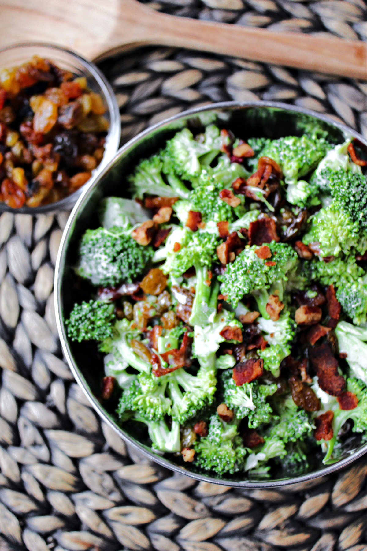 broccoli salad in a silver bowl.