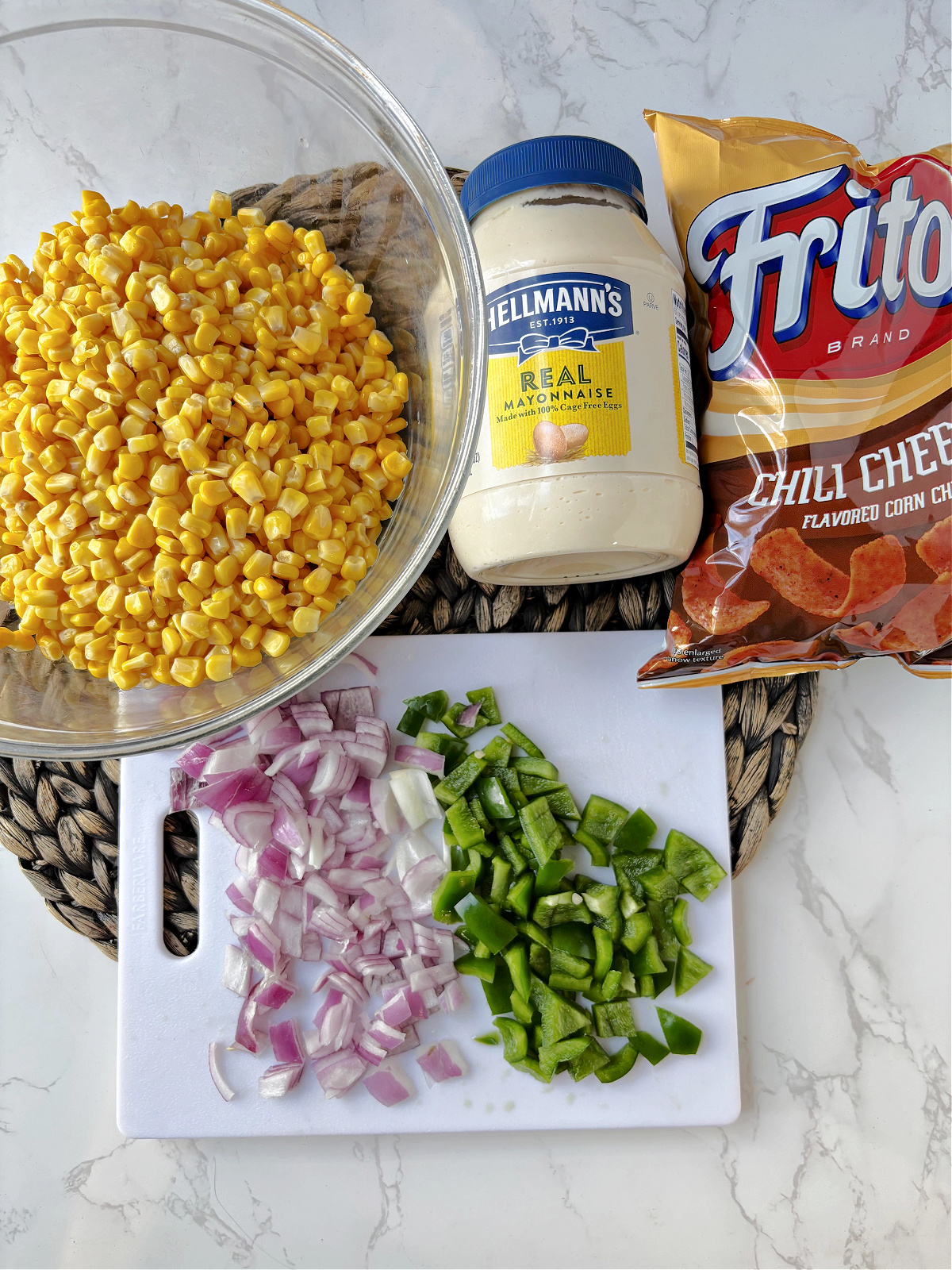 corn, onion, green pepper, mayo and Fritos.