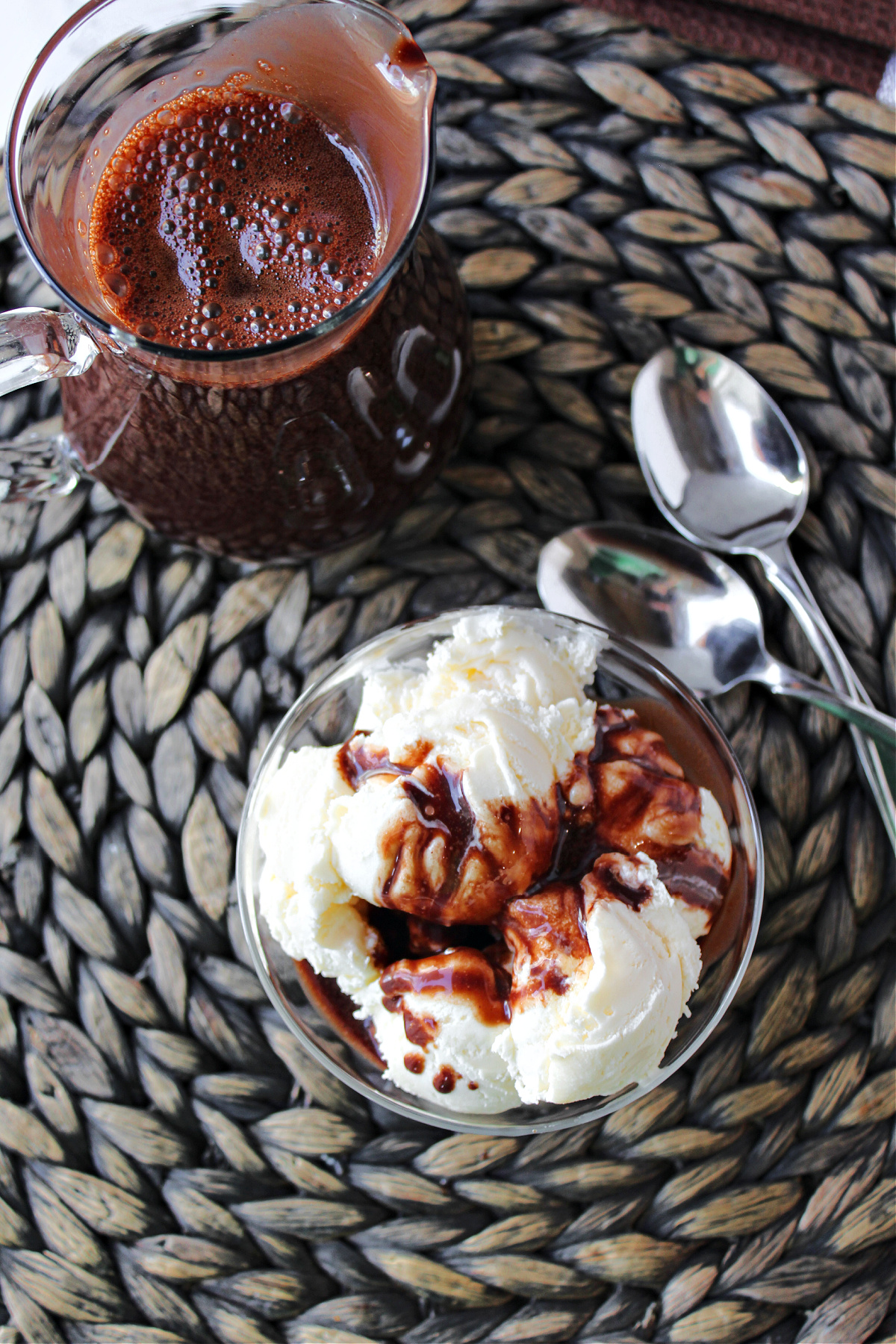 homemade chocolate sauce in a glass pitcher.