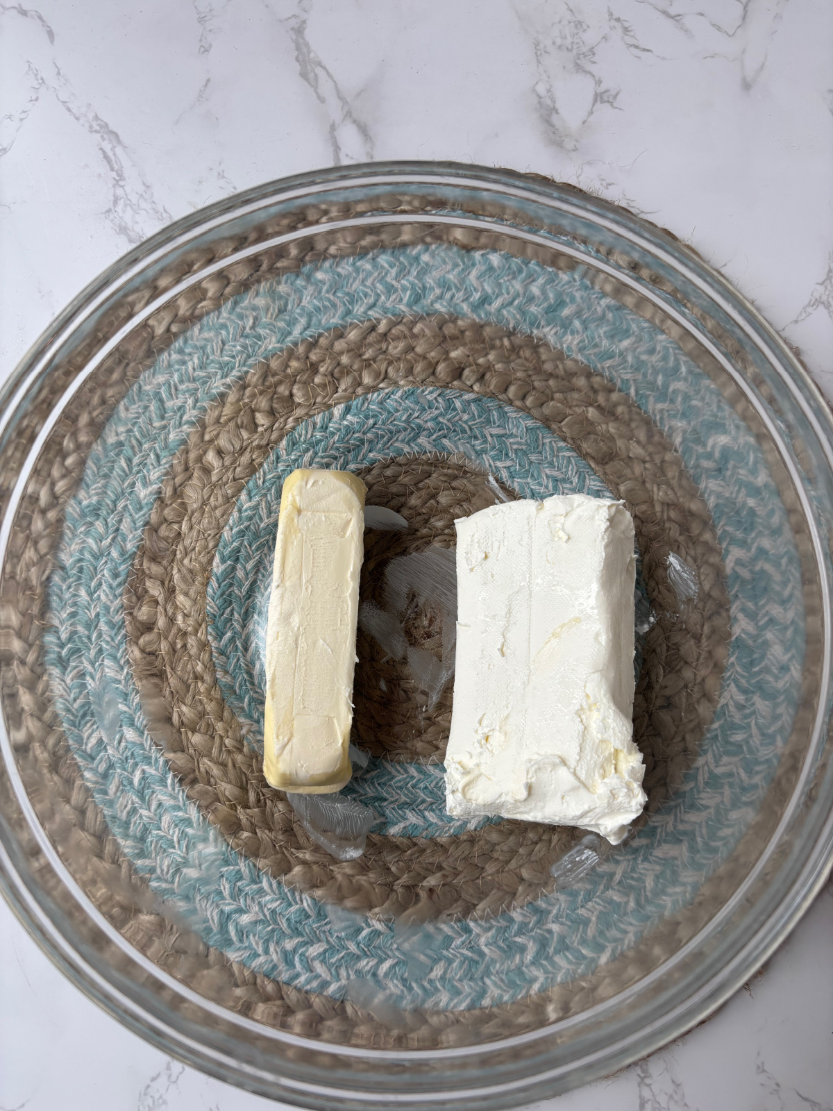 butter and cream cheese in a bowl.
