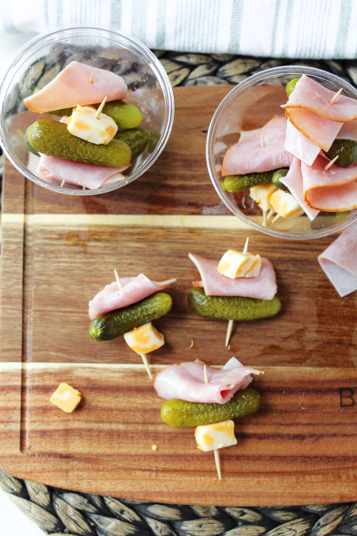 ham and cheese with pickles on toothpicks.