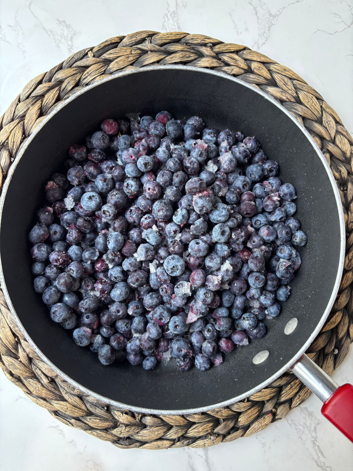 blueberries in a pan ready to be cooked.