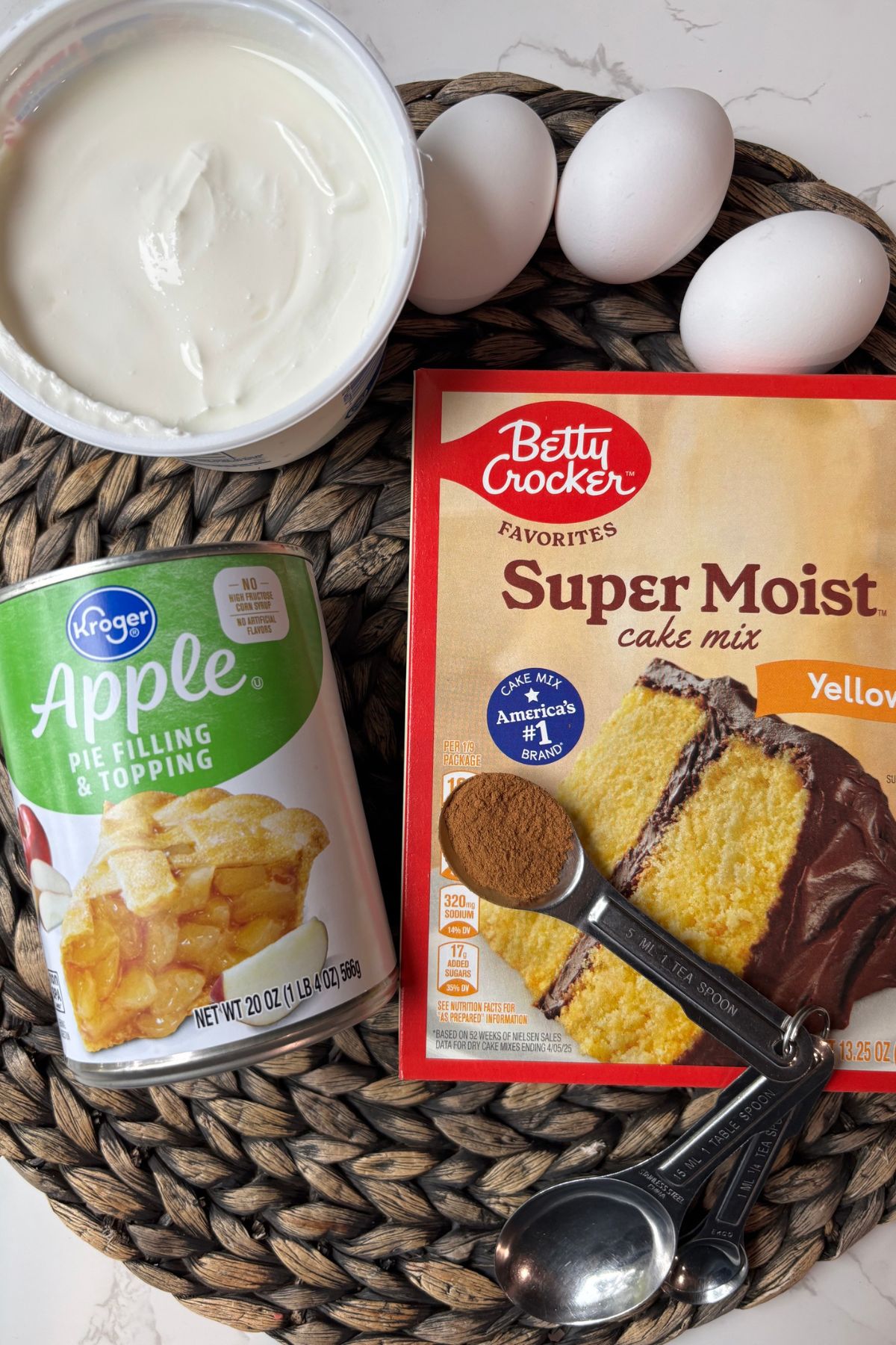 cake mix, apple pie filling, eggs and sour cream.