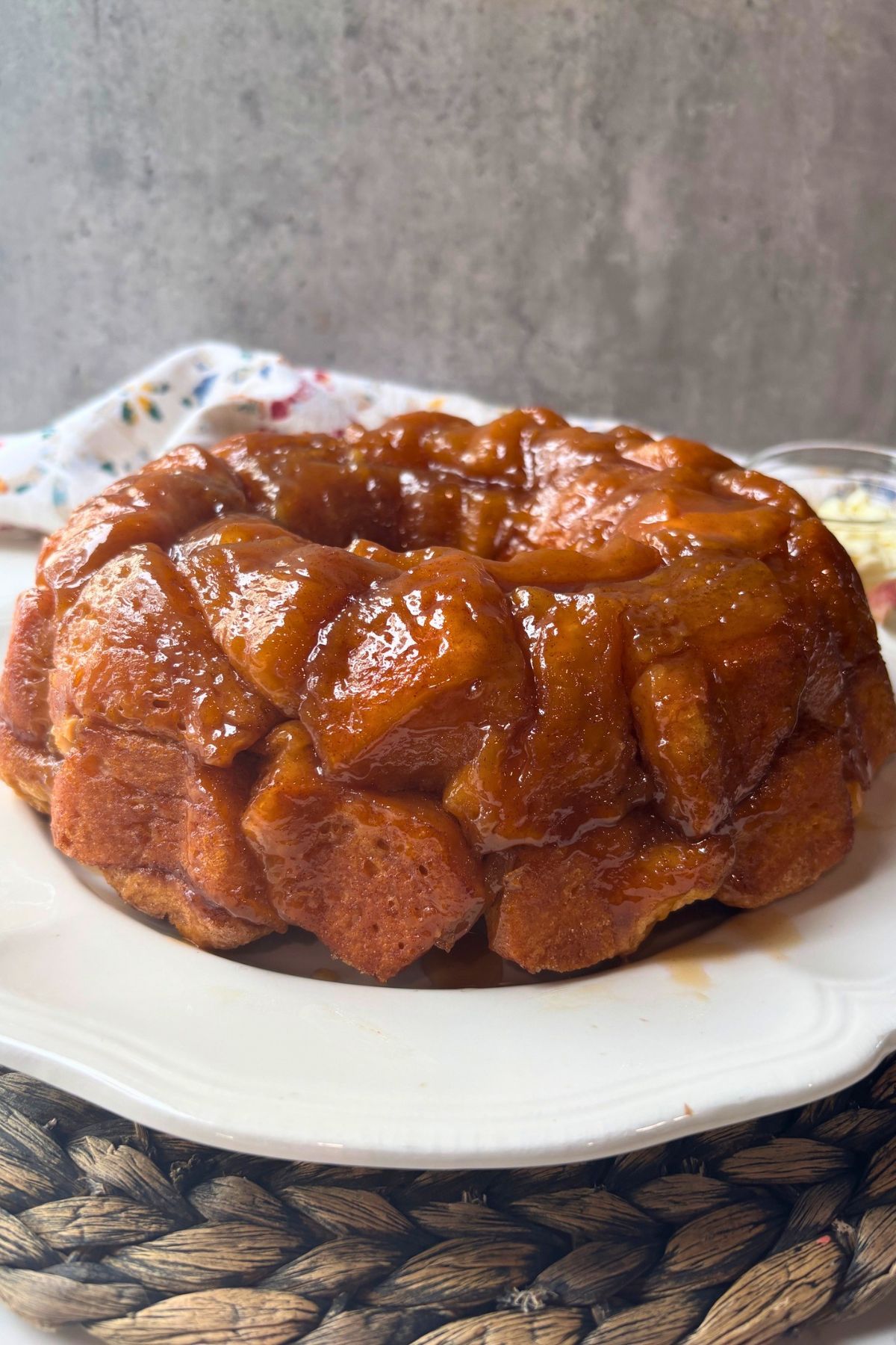 brown sugar apple monkey bread on a brown mat.