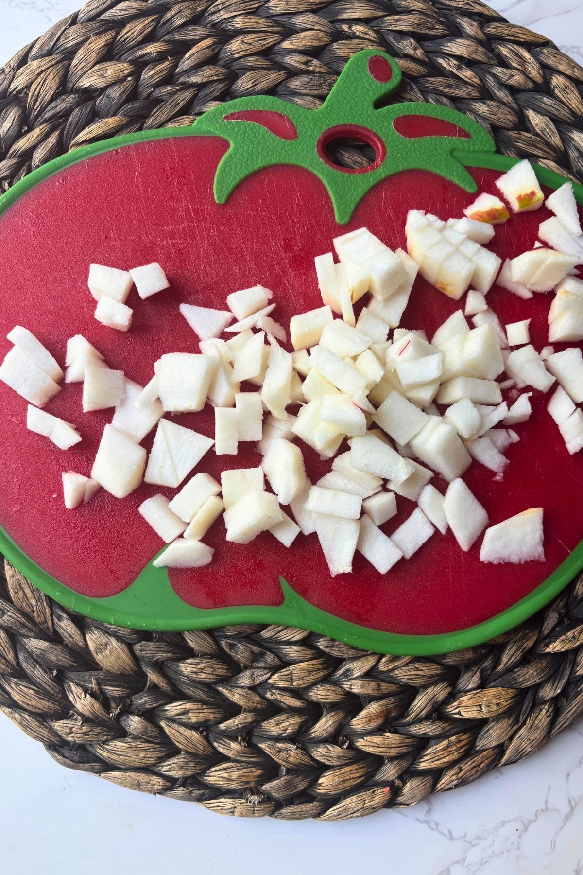chopped apples on a cutting board.